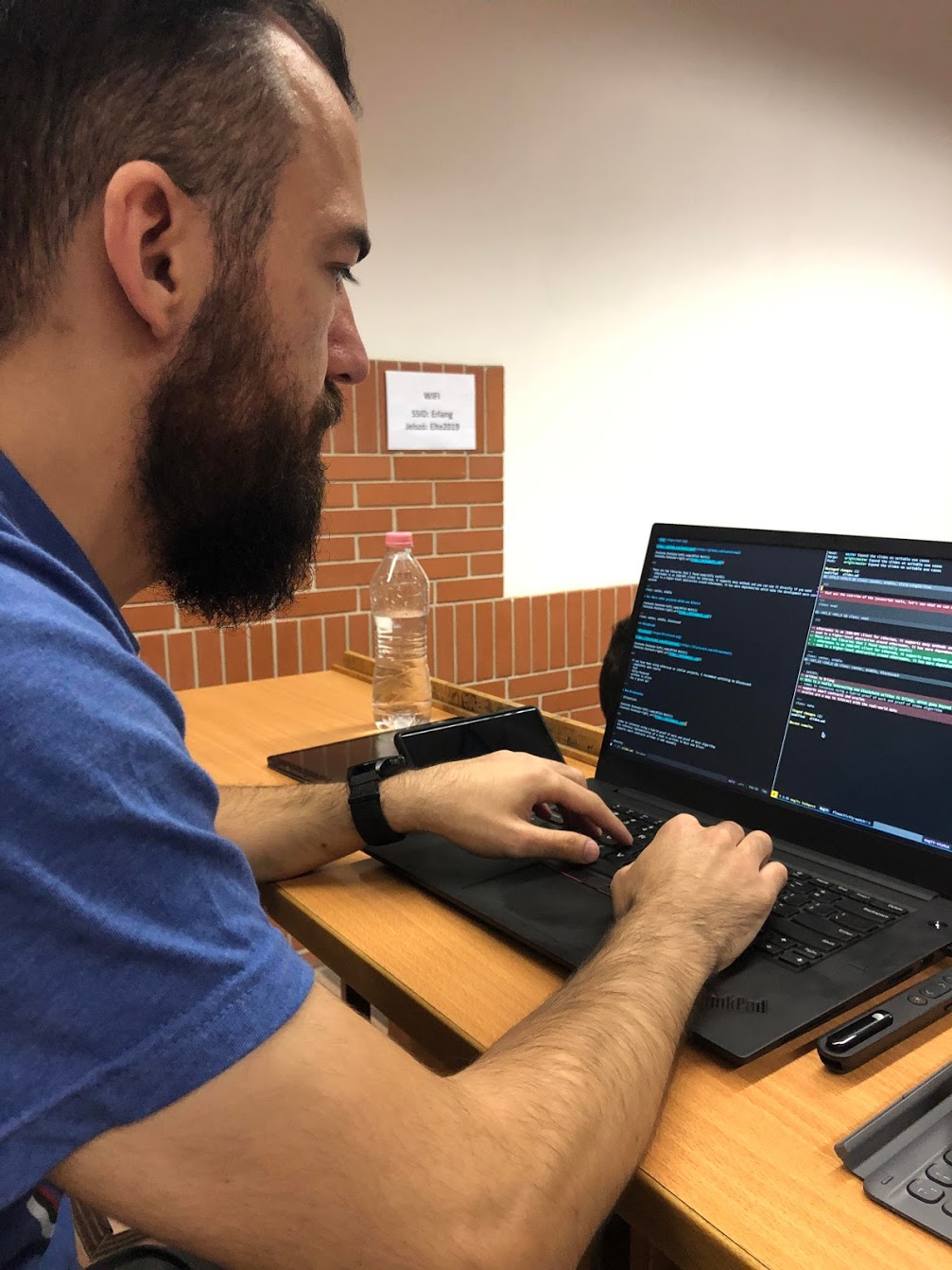 Miloš Mošić preparing code for the Blockchain presentation